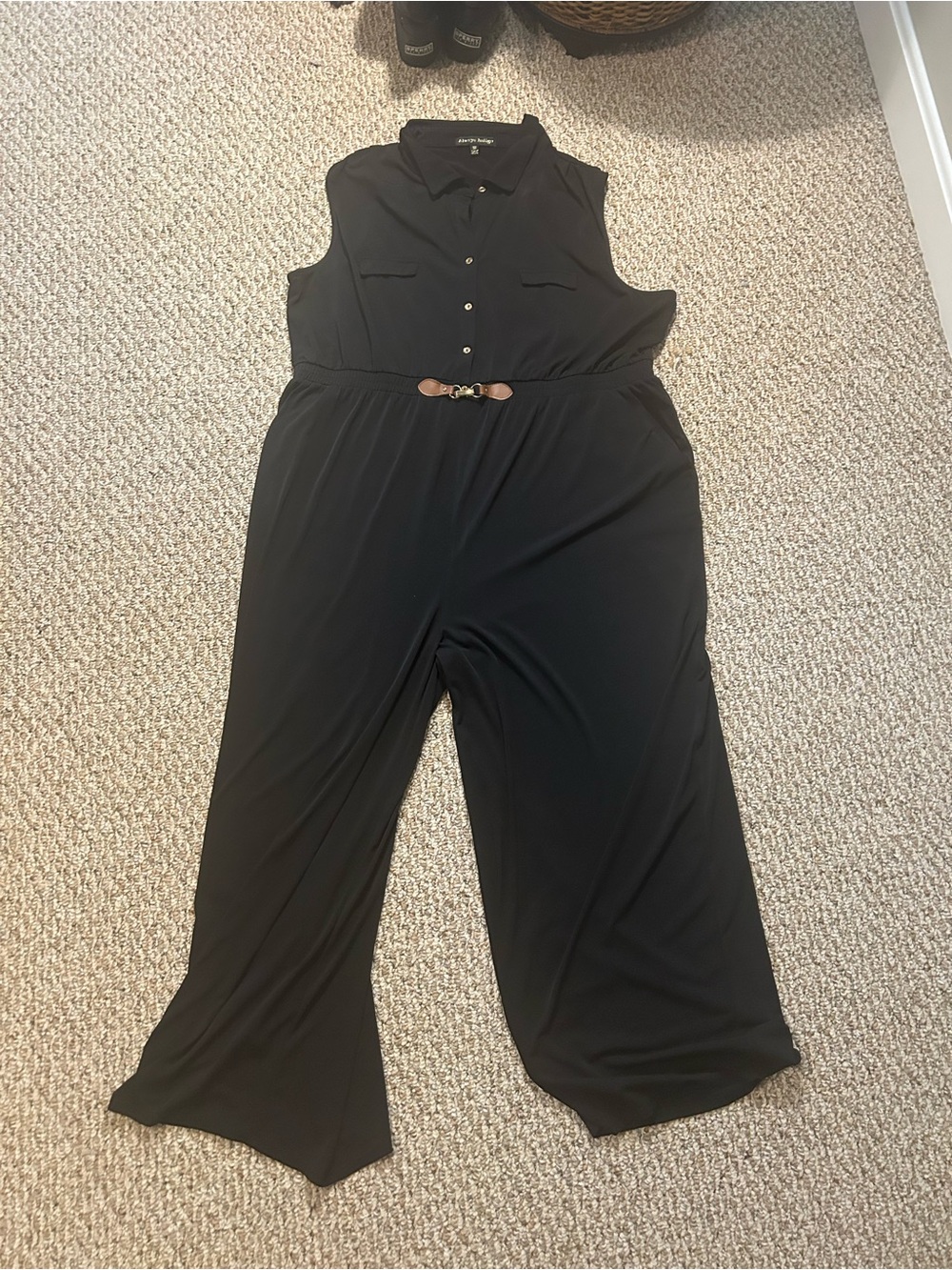 Sleeveless Collared Black Jumpsuit with Decorative Waist Accent